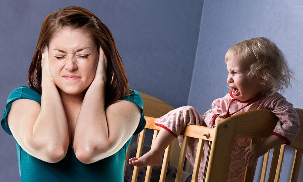 Exhausted parent at the end of another difficult bedtime with an unsettled child